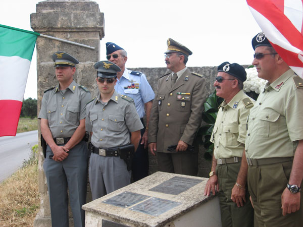 25 Pete with military in front of memorial